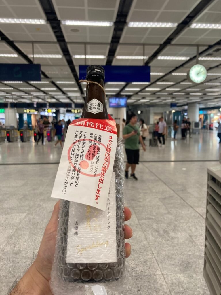 在屯門西鐵站交收的雪之美人貴釀酒